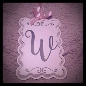 W metal hanging sign